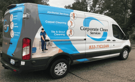 a white van with a blue sign